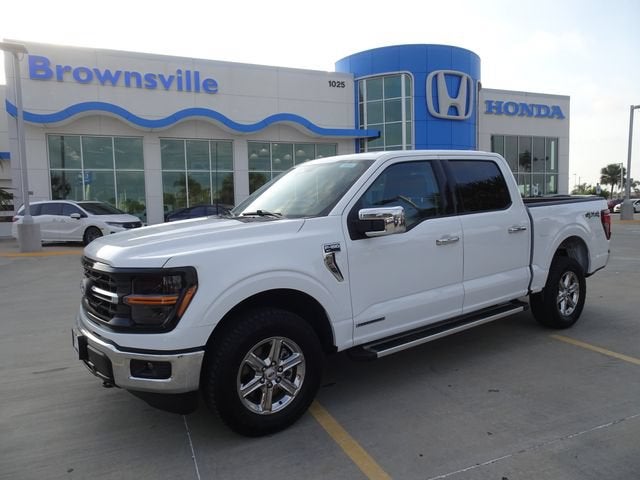 2025 Ford F-150 XLT in Oxford White — front three-quarter view