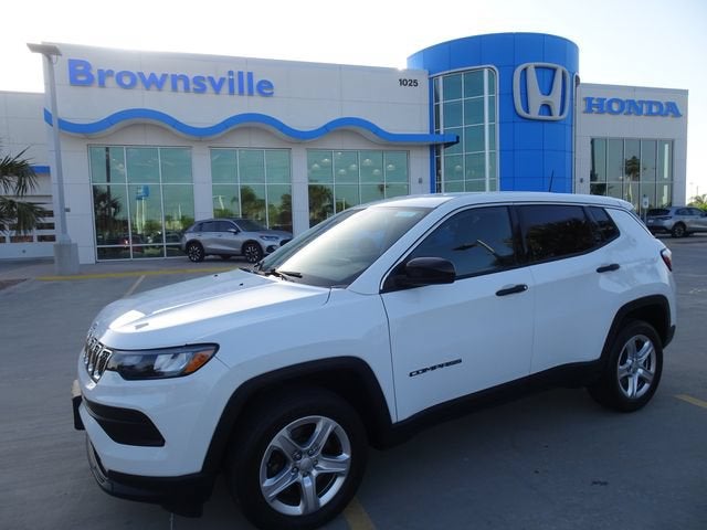 2023 Jeep Compass Sport in Bright White Clearcoat — front three-quarter view