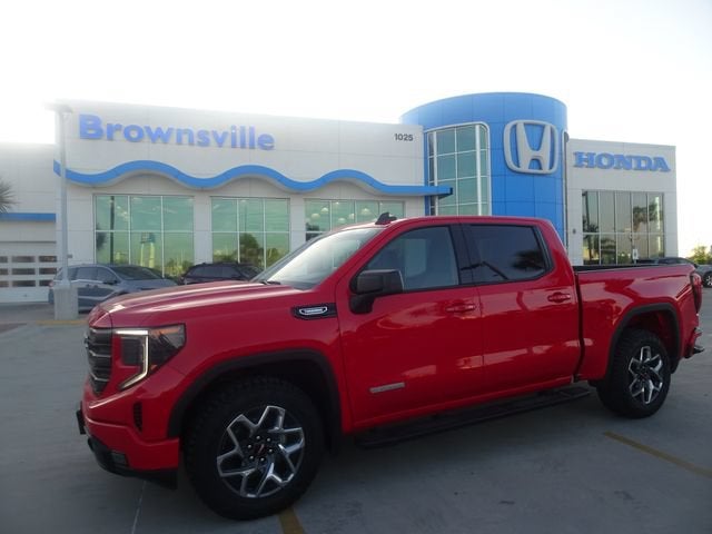 2025 GMC Sierra 1500 Elevation in Cardinal Red — front three-quarter view