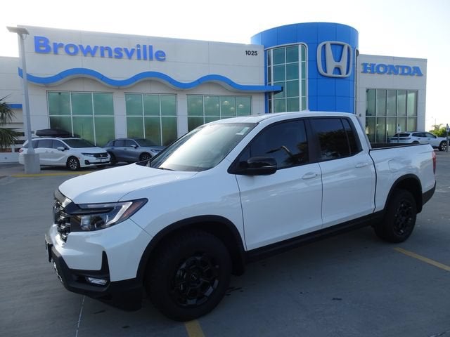 2026 Honda Ridgeline TrailSport+ in Platinum White Pearl — front three-quarter view
