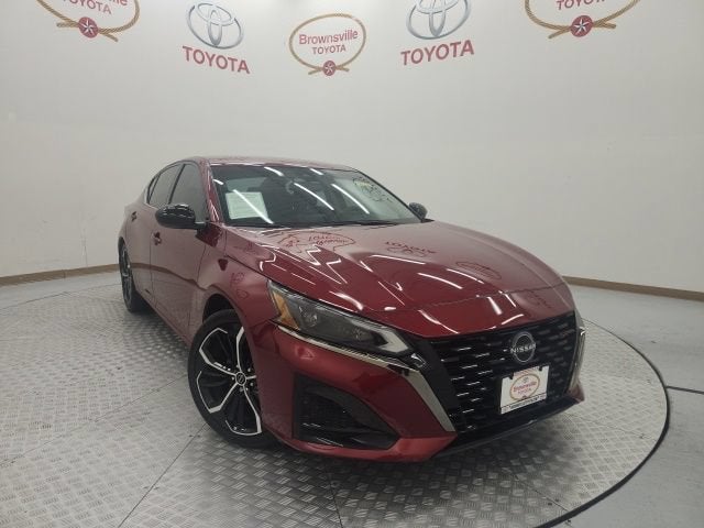 2024 Nissan Altima 2.5 SR in Scarlet Ember — front three-quarter view
