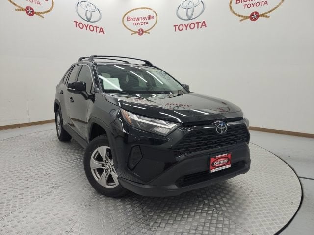 2023 Toyota RAV4 XLE in Midnight Black Metallic — front three-quarter view