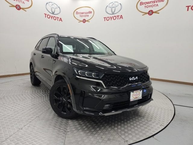 2023 Kia Sorento SX in Ebony Black — front three-quarter view